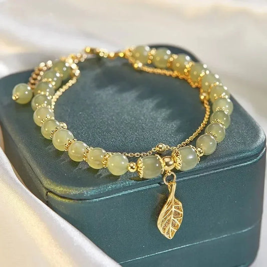 Emerald Glow Gold Bracelet