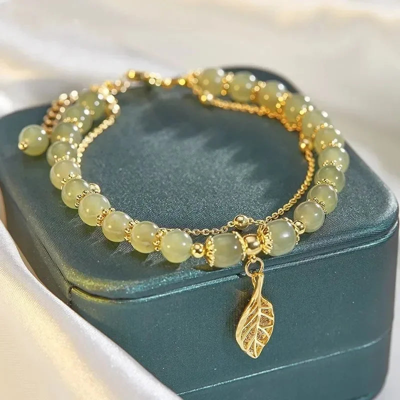 Emerald Glow Gold Bracelet