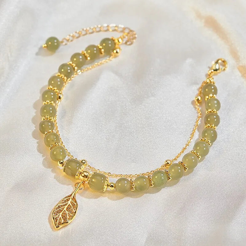 Emerald Glow Gold Bracelet