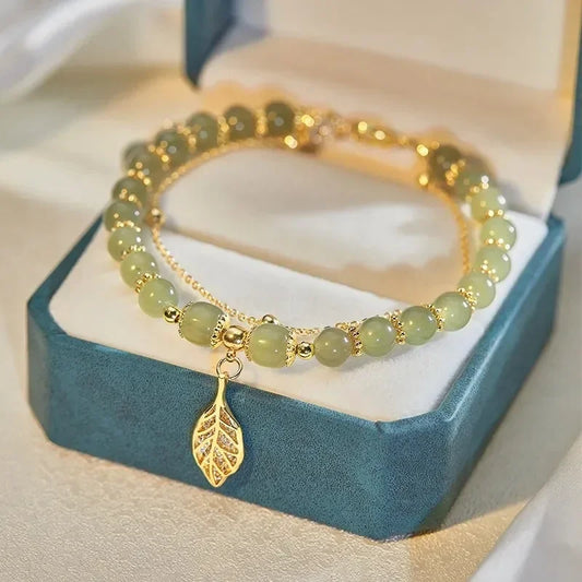 Emerald Glow Gold Bracelet